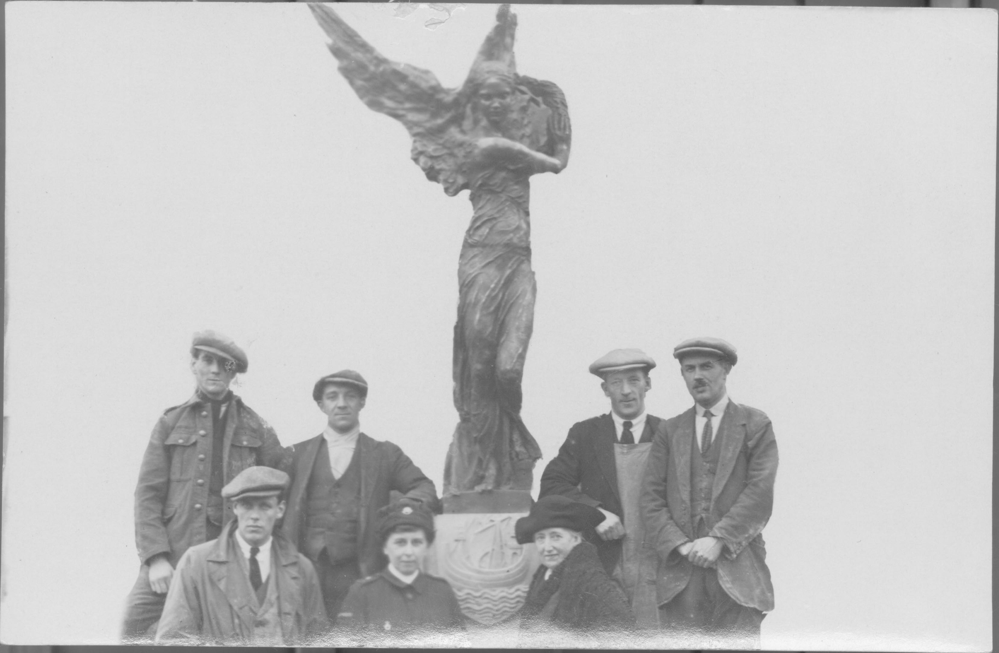 Miss Winser and some of the others involved in the Alexandra Park commission pictured with the sculpture